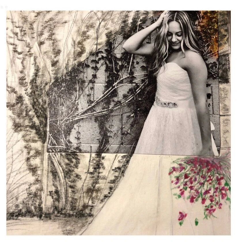 A woman in a white strapless wedding dress smiles while posed against a textured background of ivy, capturing a moment of joy and beauty.
