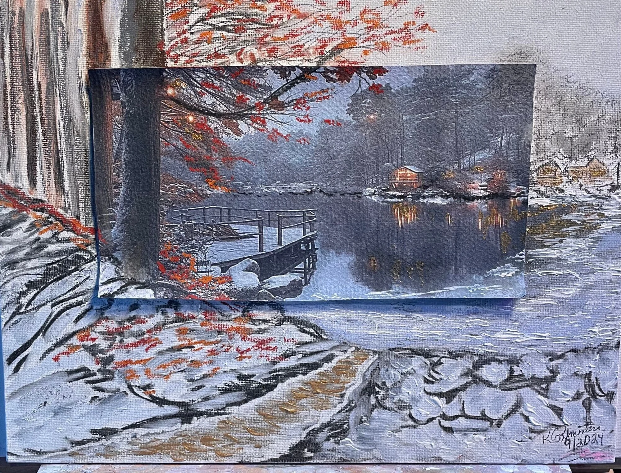 A winter scene features a textured painting with vibrant autumn leaves and a serene lake, reflecting cozy cabin lights, emphasizing nature's tranquility.
