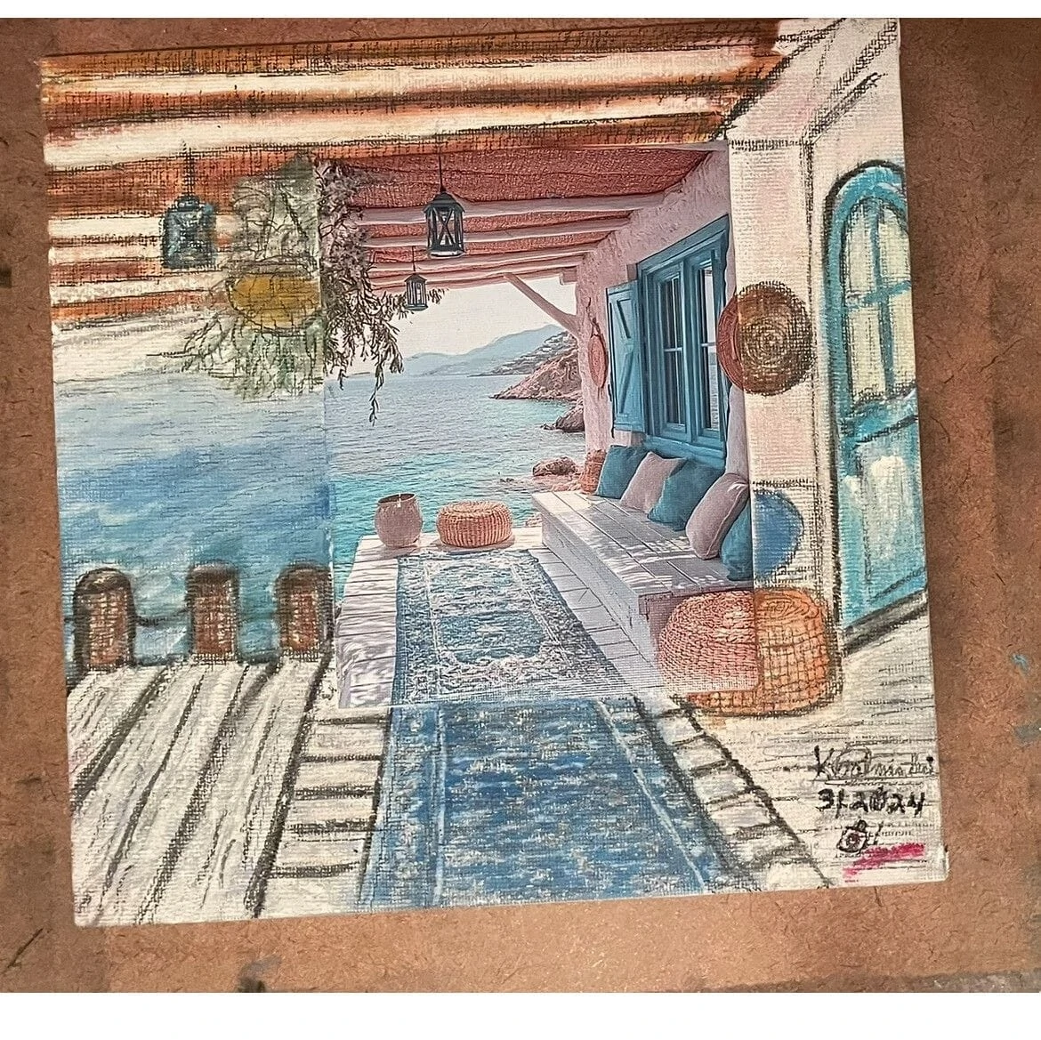 Cozy seaside patio scene with blue accents, featuring a cushioned bench, woven baskets, and stunning ocean views. Captures a tranquil atmosphere.